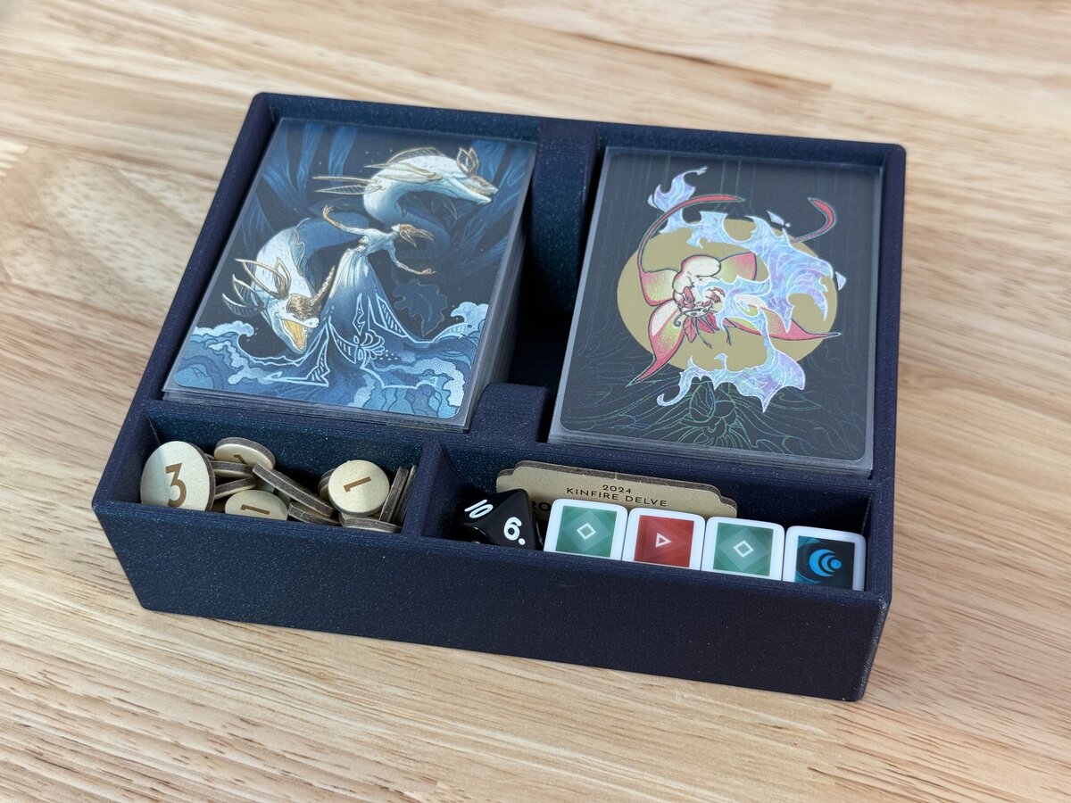 Close-up of insert with sleeved cards